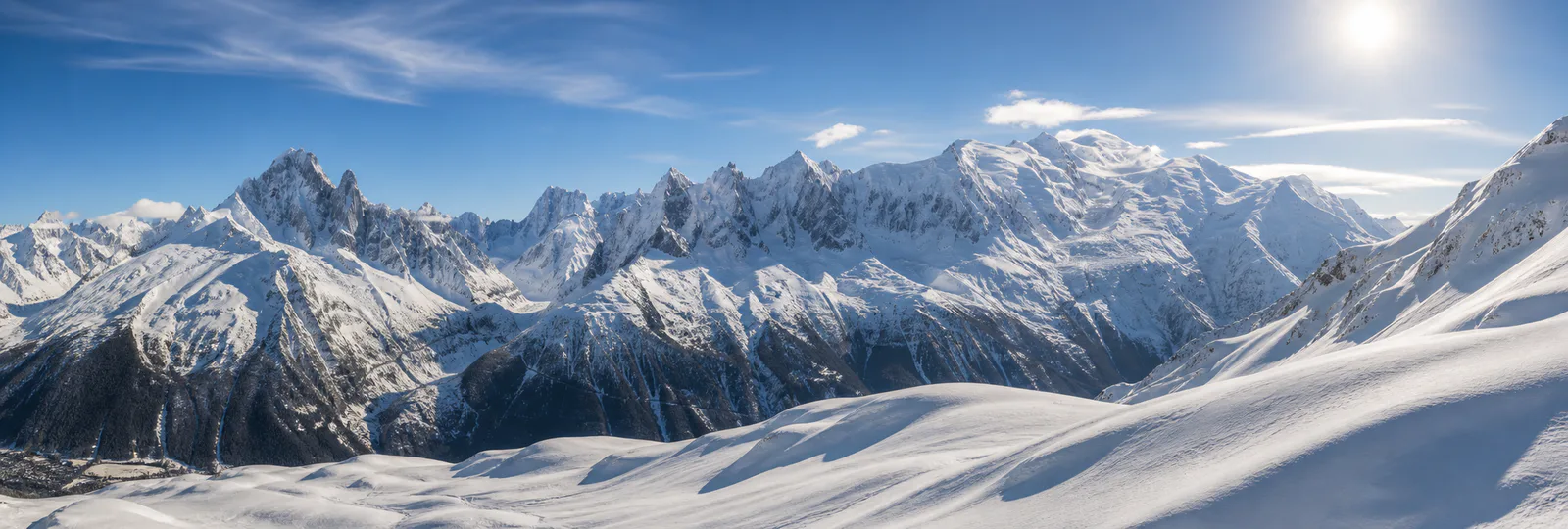 Chamonix snowy Mont Blanc massif and high Alpine slopes