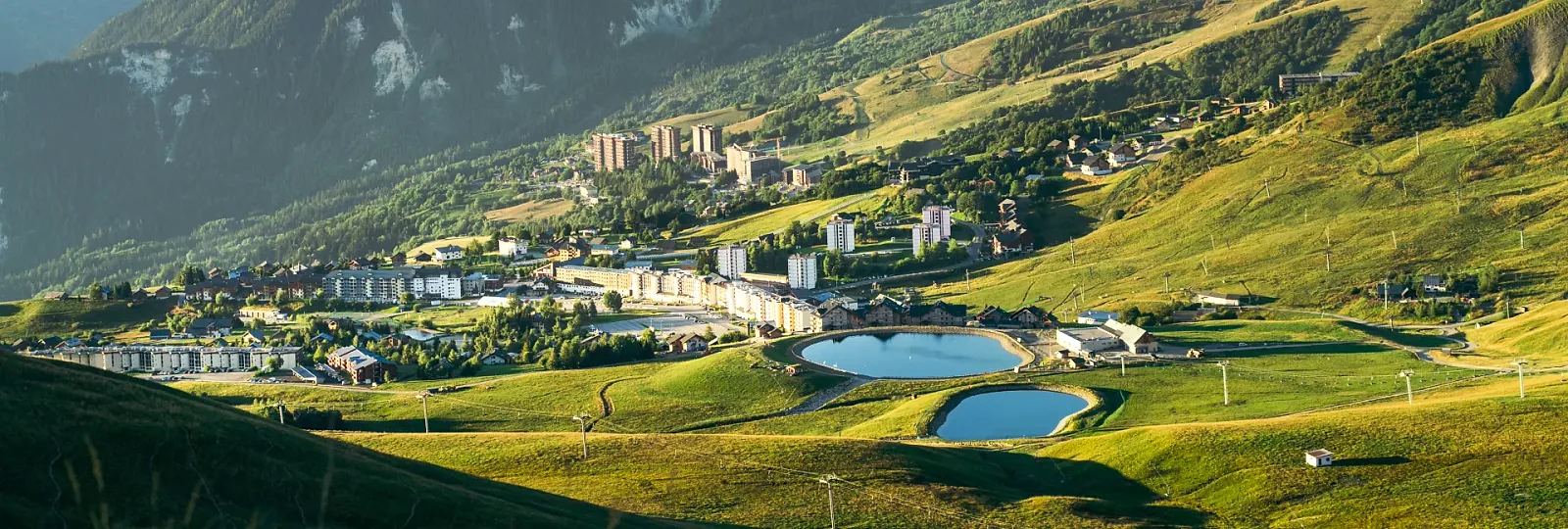 La Toussuire summer resort and green Les Sybelles slopes