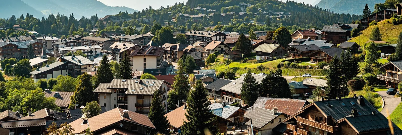 Les Carroz summer village and Grand Massif mountain views