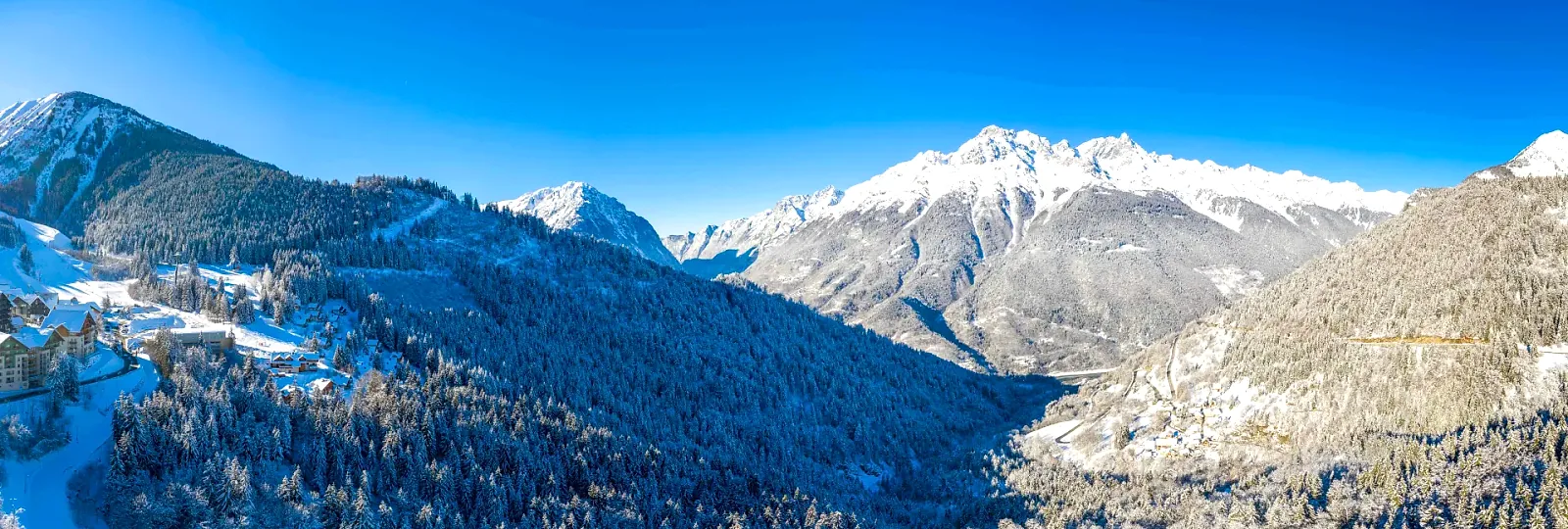 Oz 3300 summer resort and Oisans mountain panorama