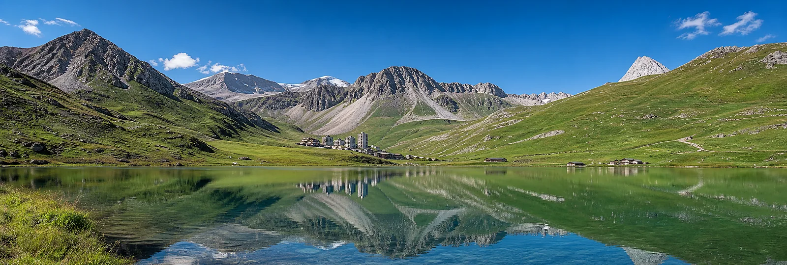 Tignes lake and high Alpine mountain landscape