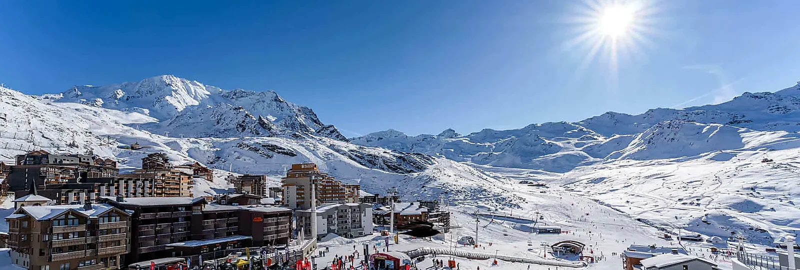 Val Thorens resort, ski slopes and snowy mountain bowl