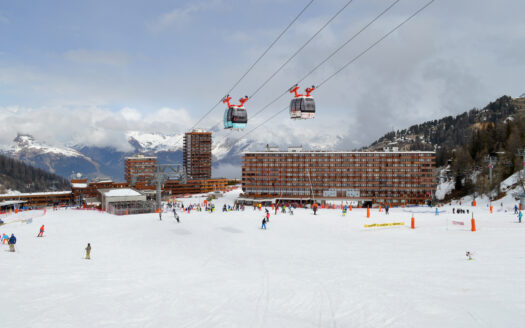 Ski resort apartment buildings in the French Alps — copropriété charges buyer guide