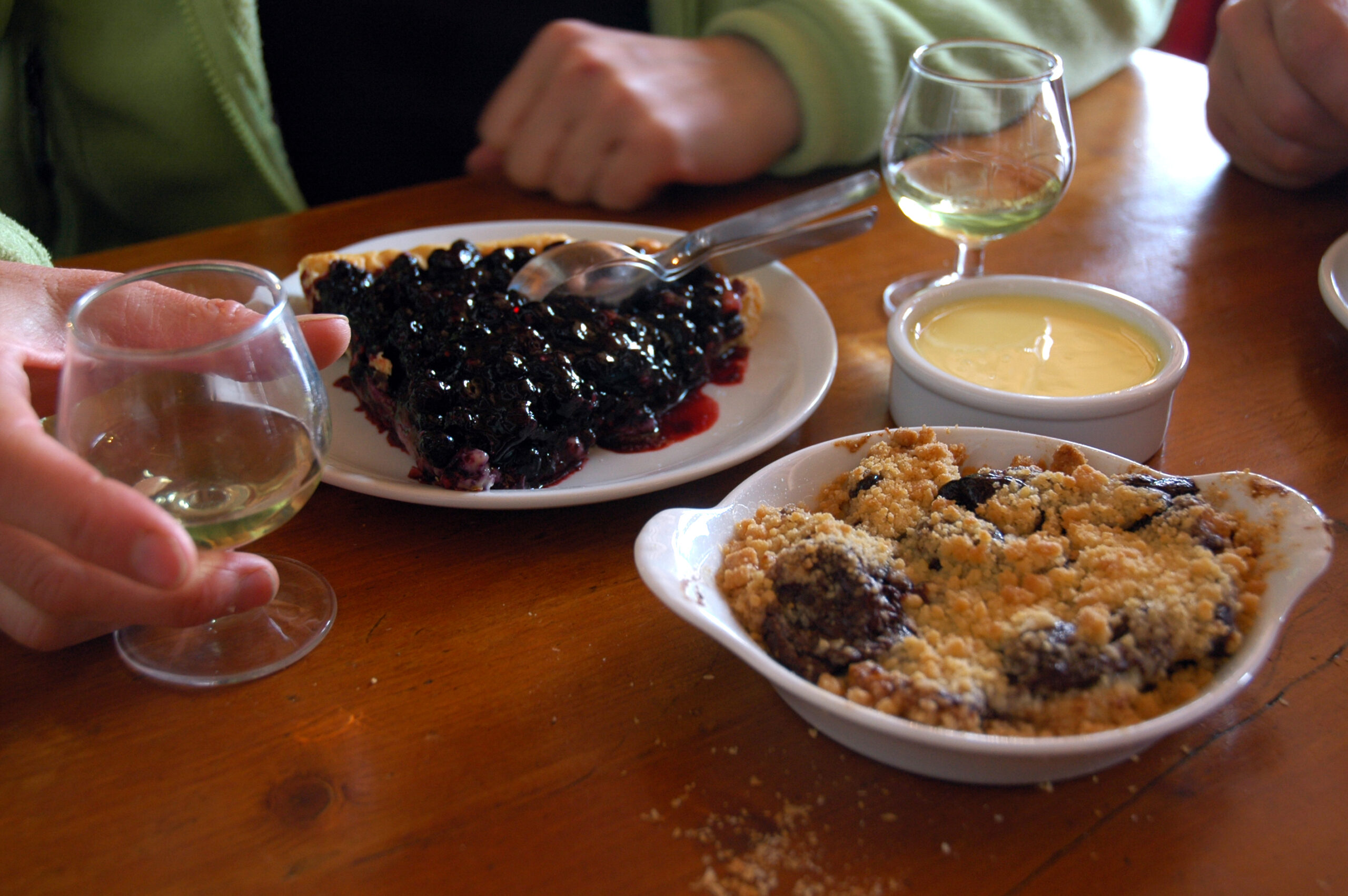 Génépi alpine liqueur served at a mountain restaurant in Les Arcs, French Alps